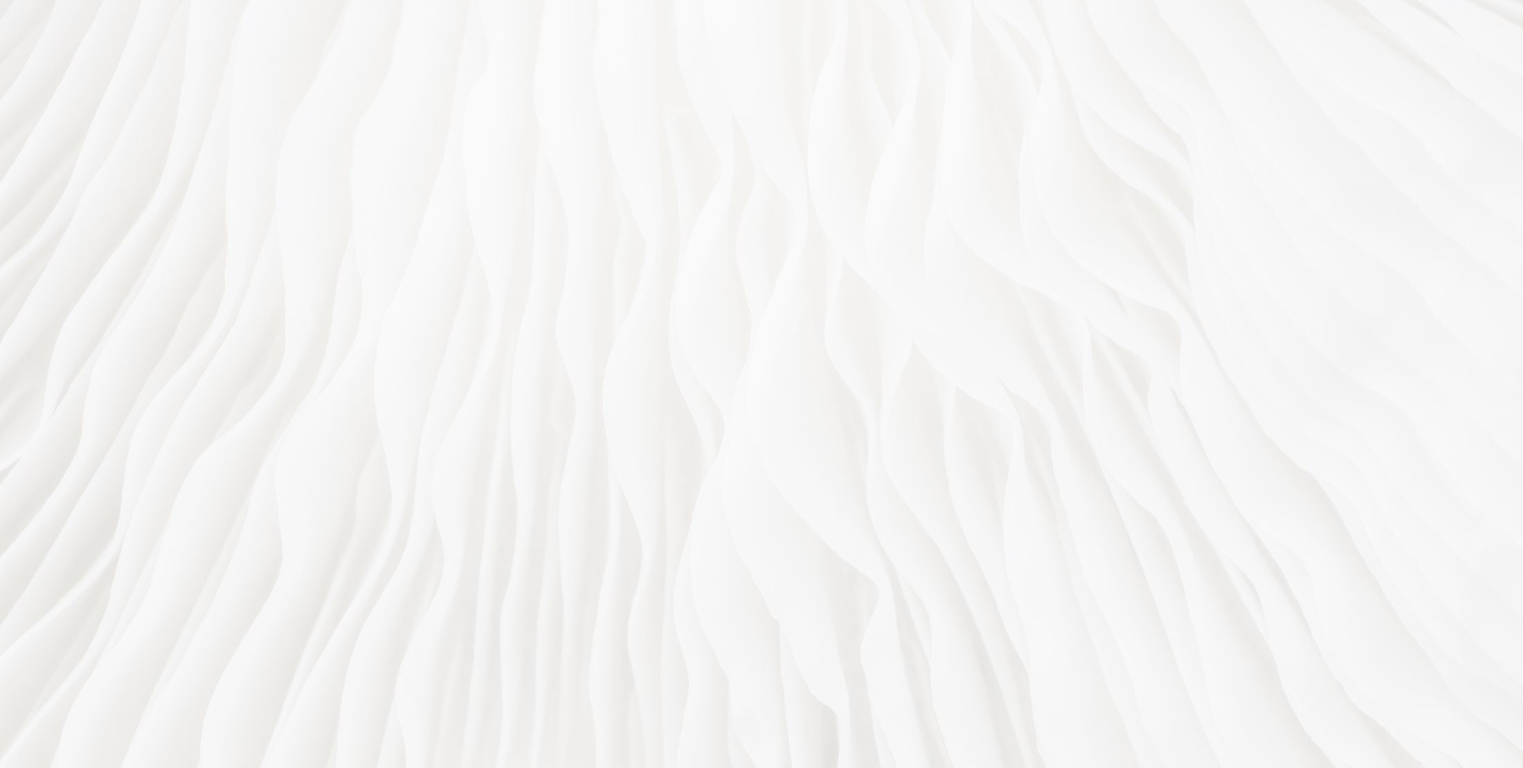 Textured white fabric with soft, wave-like patterns.