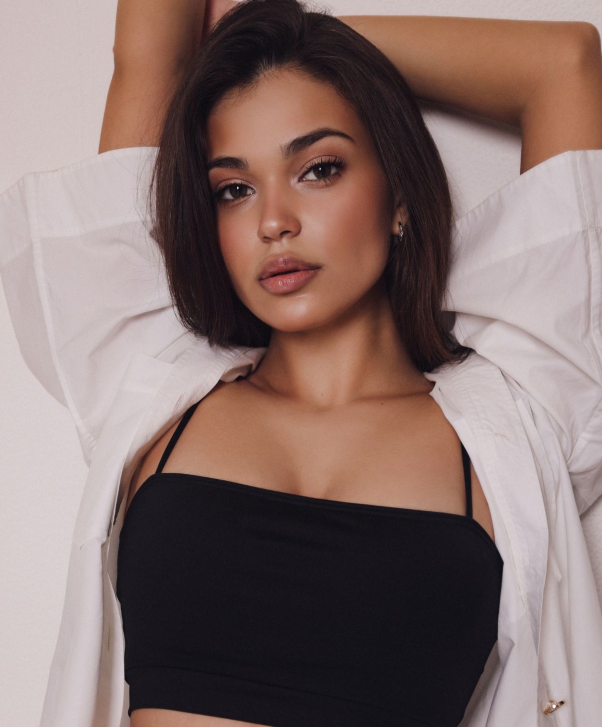 Portrait of a woman in a black top.