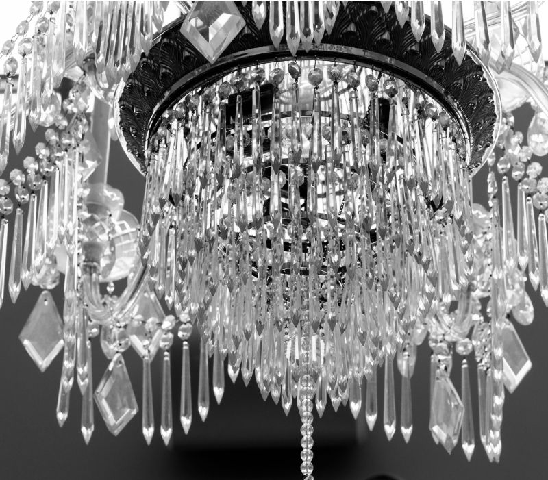 Intricate crystal chandelier in black and white.
