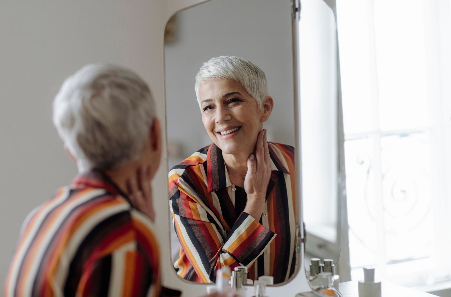 Profile of a woman with soft makeup.