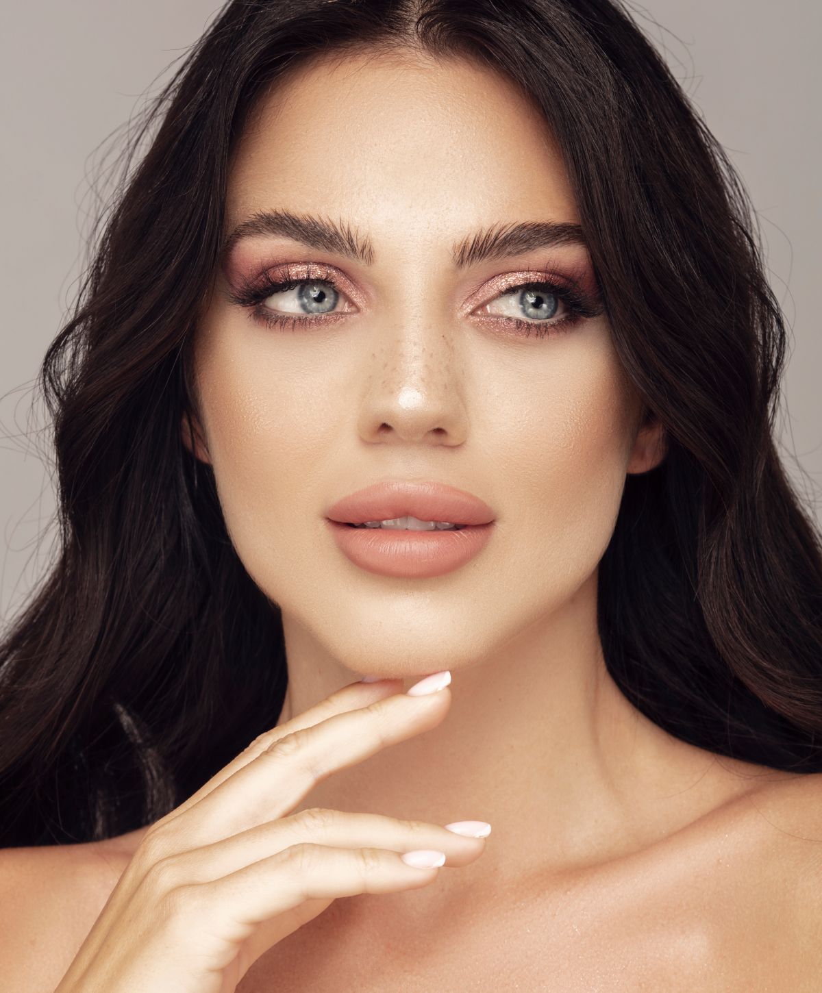 Close-up of a woman with stylish makeup.