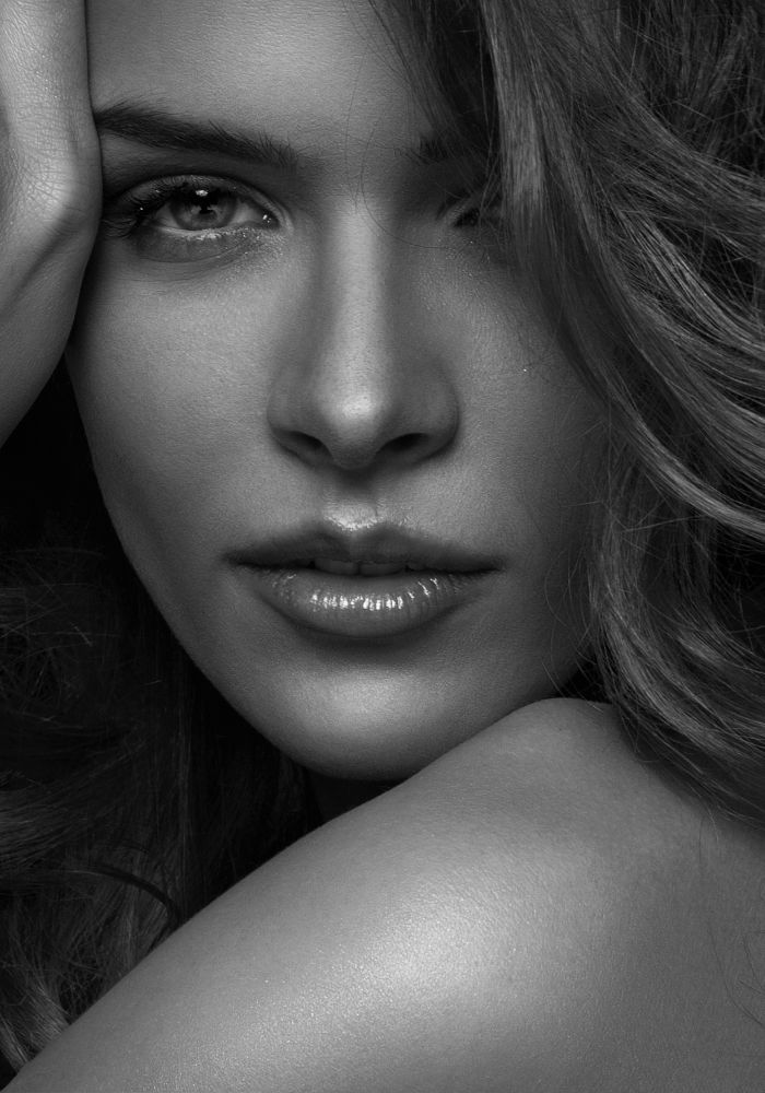 Black and white portrait of a woman.